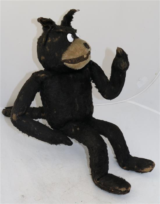 An early black plush straw filled model of Felix The Cat, 18in.